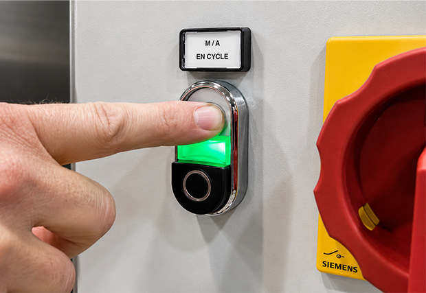 Bouton pour activer le séchage sur demande de la laveuse de pièce éco
