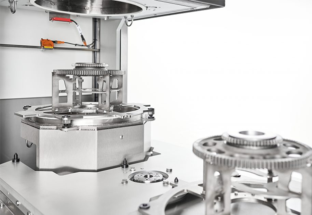 Machine de lavage évolutive et modulable avec chargement et déchargement en temps masqué