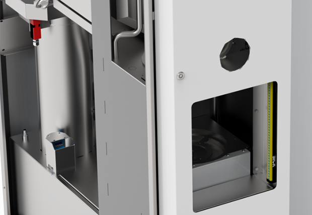 Zoom sur le poste de chargement de la machine de lavage de pièce Mecanofast
