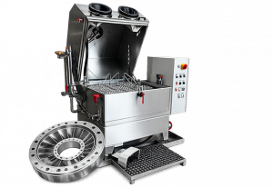 Machine de dégraissage avec pièce aéronautique